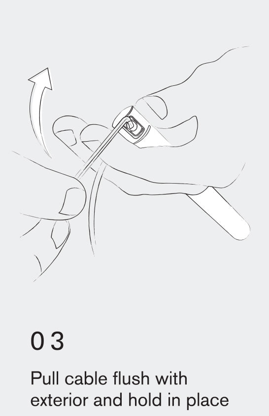 Step 3. Put cable through handle and flush with exterior and hold in place